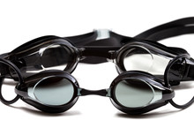 Two Black Goggles For Swimming On White Background