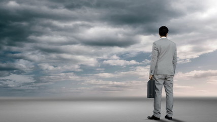 Poster - Businessman looking at brainstorm in desert