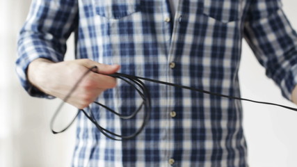 Wall Mural - close up of man untangling wires