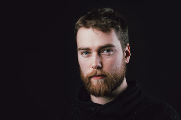 Portrait of a handsome young man. Studio shot.
