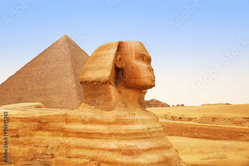 Fototapeta na wymiar Great Sphinx of Giza and Pyramid. Cairo, Egypt