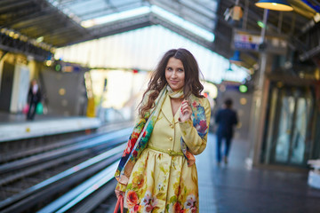 Poster - Woman waiting for a train