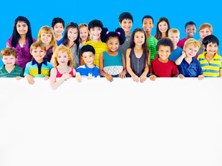 Wall Mural - Multi-Ethnic Group of Children Holding Empty Billboard