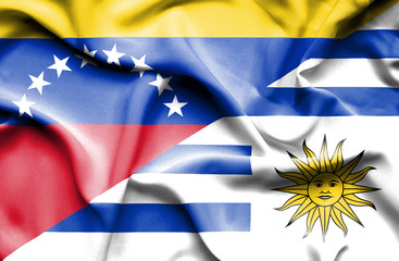 Waving flag of Uruguay and Venezuela