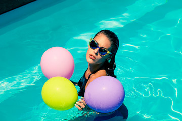 Sticker - woman in pool with balloons