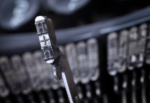H hammer - old manual typewriter - cold blue filter