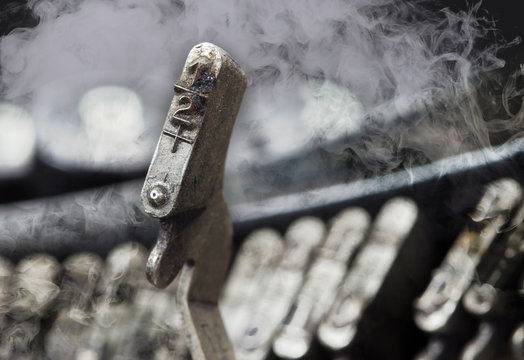 Half hammer - old manual typewriter - mystery smoke