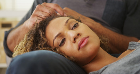 Wall Mural - Closeup of girlfriend lying on boyfriend's lap