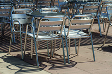 Street Cafe Empty Aluminium Chairs.