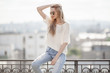 © yuriyzhuravov - Fashion model. Summer look. Jeans, sweater, sunglasses.