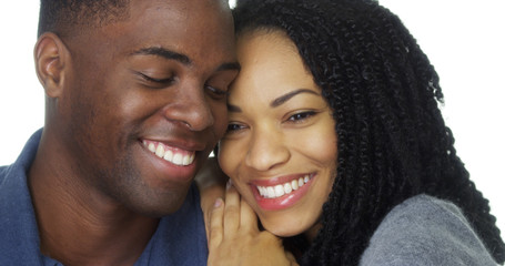 Close up of young black couple looking into each others eyes