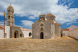 Greek church in the middle of a yard of a monastery.