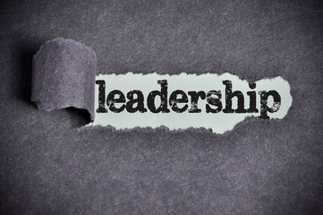 leadership word under torn black sugar paper