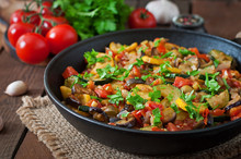 A vibrant bowl of French ratatouille filled with colorful vegetables