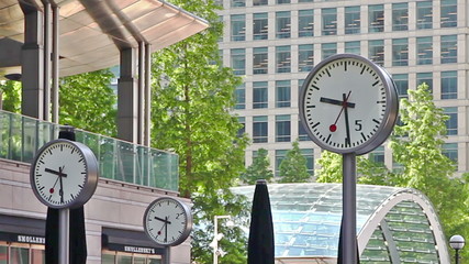 Wall Mural - LONDON, UK - JULY 03, 2014: Commuters rushing to work in Canary Wharf.