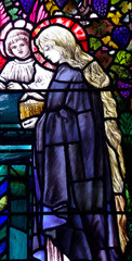 Wall Mural - St. Mary and an angel in stained glass