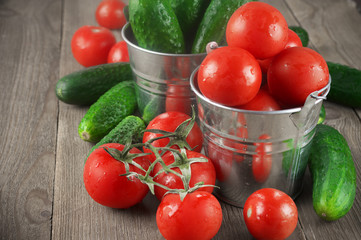 Wall Mural - Tomatoes and cucumbers in buckets