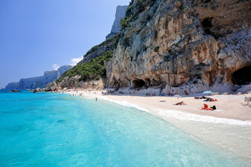 Amazing sandy beach and blue sky called Cala Mariolu beach, near Cala Biriola and Cala Goloritze, Baunei, Sardinia, Italy