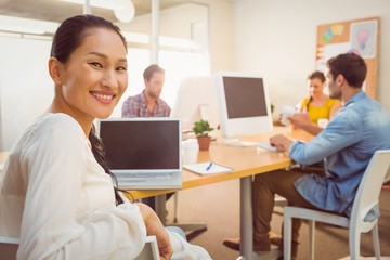 Sticker - Smiling businesswoman looking at the camera