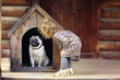 © kichigin19 - girl and small dog, dog house