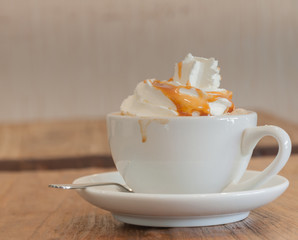 Hot coffee with caramel whipping cream