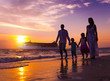 © Rawpixel.com - Family Walking Beach Sunset Travel Holiday Concept