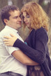 © kichigin19 - Young couple hugging in the park summer