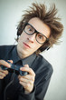 Young nerd playing video games