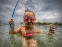 Little Girl Playing In Sea Water