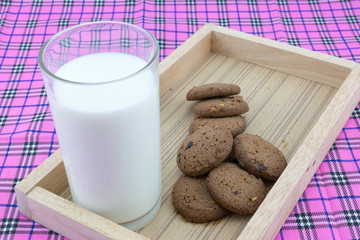 Cookie and Milk In a wooden tray