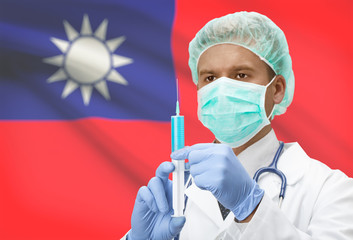 Doctor with syringe in hands and flag on background series - Taiwan