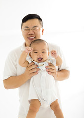 happy father with smiling baby boy