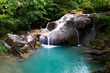 Arawan waterfall in tropical forest Thailand,leaf moving low spe