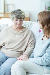 Sticker - Female senior talking with caregiver