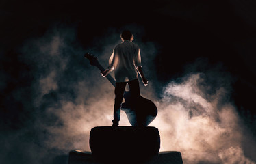  Rock musician and large guitar, a lot of smoke