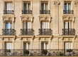 Typical facade of Parisian building near Notre-Dame