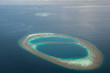 atoll in Indian ocean view from seaplane, Maldives island.