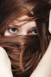 © Voyagerix - woman covers the face by long brown hairs