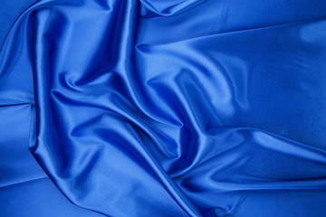 Wall Mural - Blue silk cloth texture close up.
