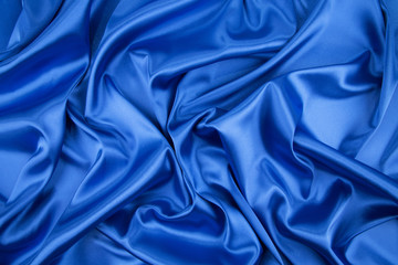 Wall Mural - Blue silk cloth texture closeup.