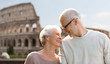 © Syda Productions - happy senior couple over coliseum in rome, italy