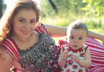 Wall Mural - mother and daughter at a picnic