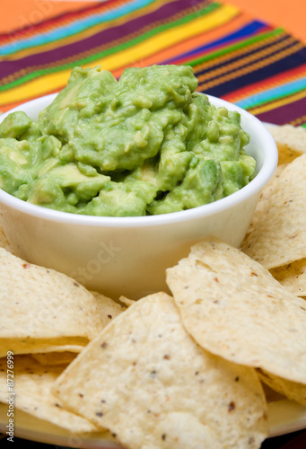 Fotografie, Obraz Fresh Guacamole and Chips – A bowl of fresh guacamole