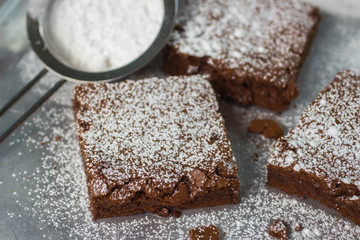 Wall Mural - Brownie. Chocolate cakes with powdered sugar