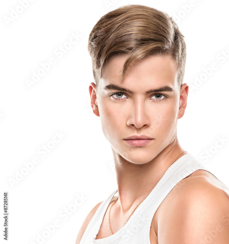 Naklejka na meble Handsome young man. Fashion young model man portrait