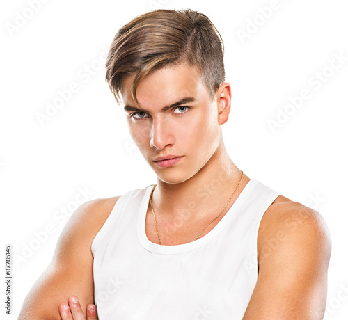 Nowoczesny obraz na płótnie Handsome athletic young man isolated on white background