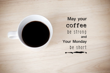Inspirational quote on coffee cup background