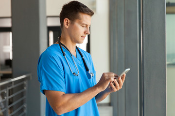 medical professional using smart phone