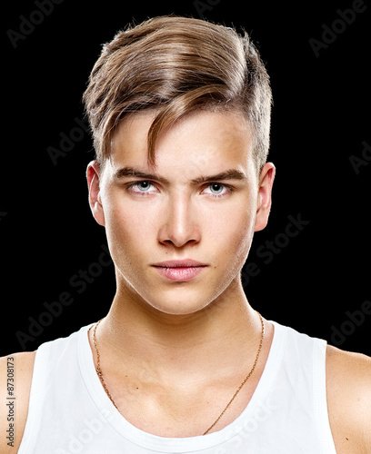 Obraz w ramie Handsome young man. Fashion young model man portrait