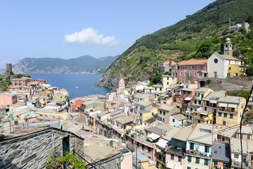 Wall Mural - Scenic view of colorful village Vernazza and ocean coast
